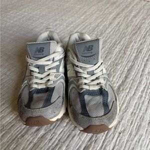 New Balance Kids Gray and White Sneakers